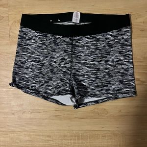Size large woman’s Stretchy shorts. Fit small.
